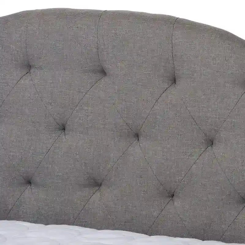 Lit de repos contemporain en tissu capitonné