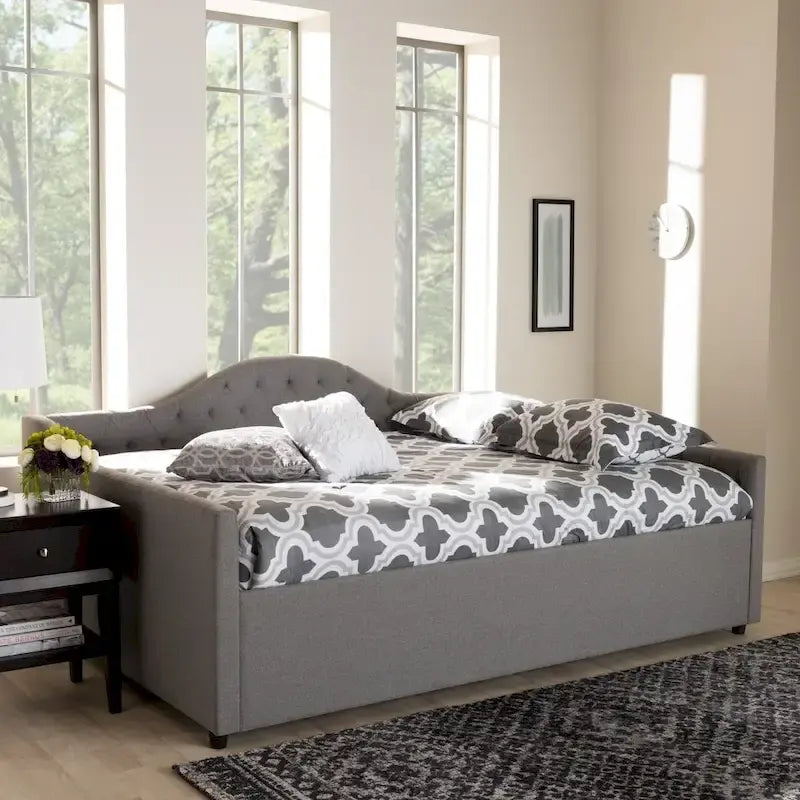 Lit de repos contemporain en tissu capitonné