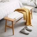 Banc en bois massif avec assise en cannage