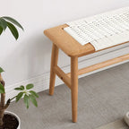 Banc en bois massif avec assise en cannage