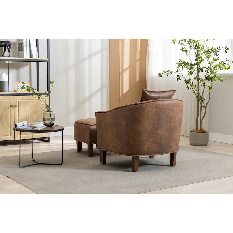 Fauteuil tonneau rembourré avec pouf