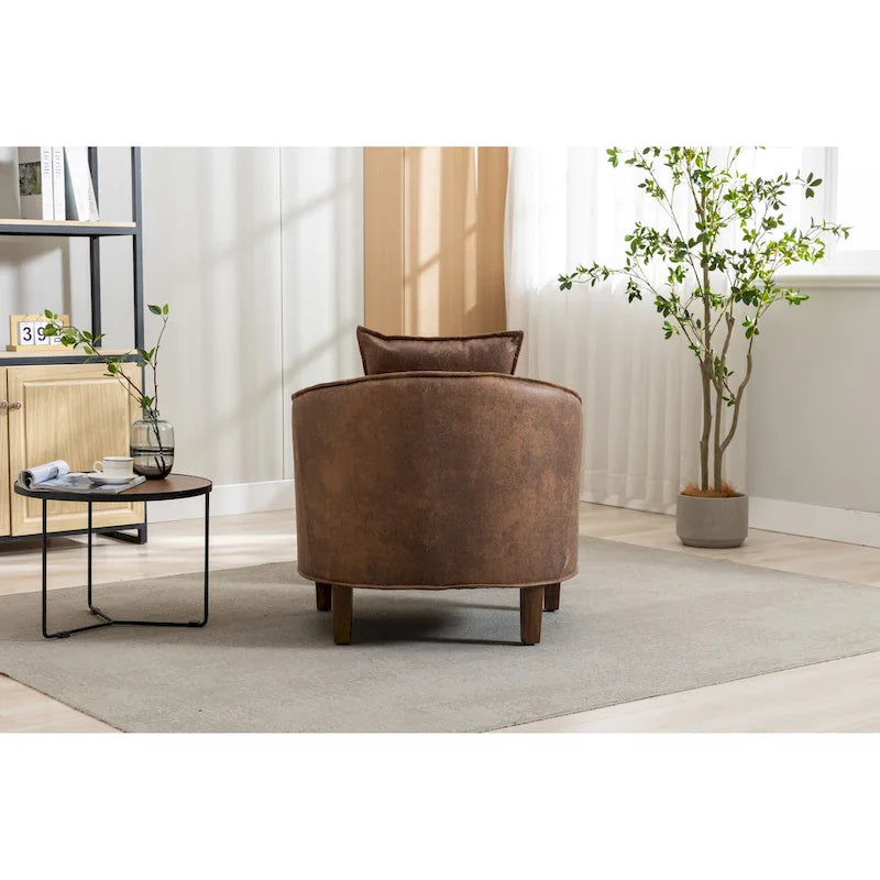 Fauteuil tonneau rembourré avec pouf