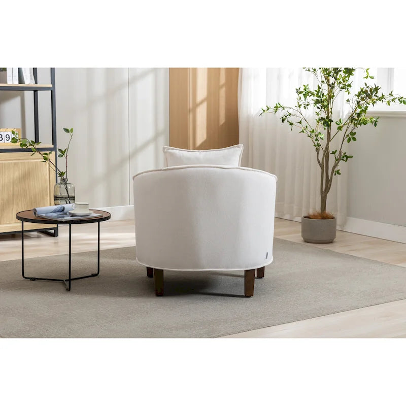 Fauteuil tonneau rembourré avec pouf