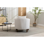 Fauteuil tonneau rembourré avec pouf