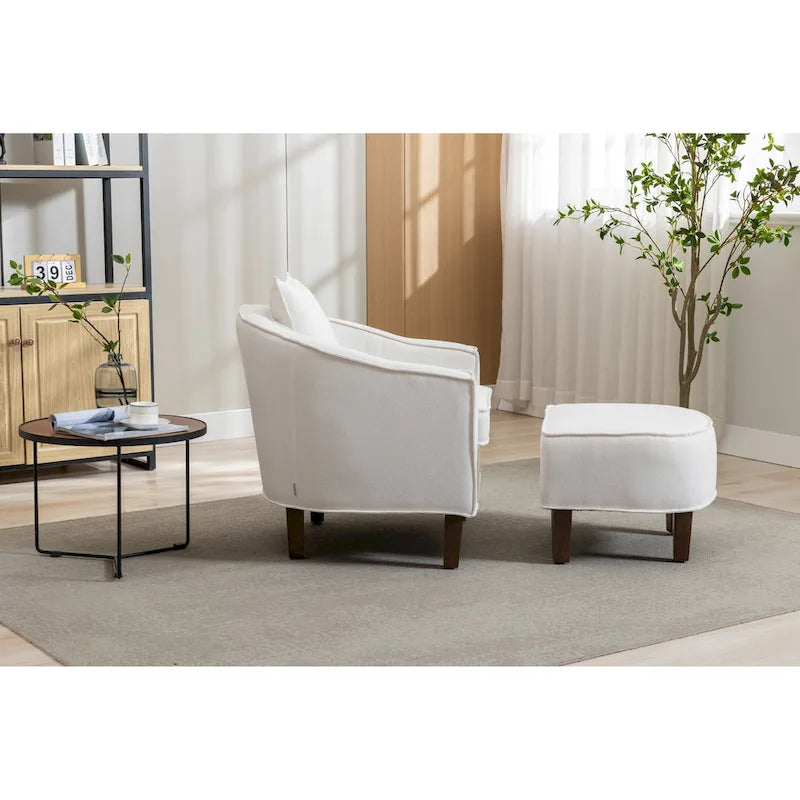 Fauteuil tonneau rembourré avec pouf