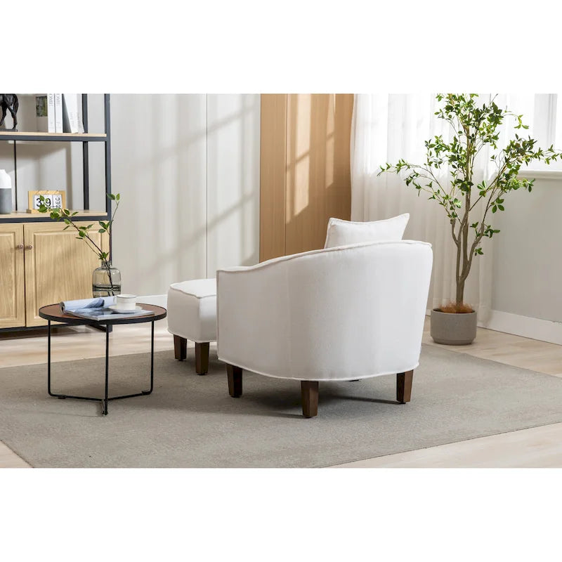 Fauteuil tonneau rembourré avec pouf