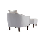 Fauteuil tonneau rembourré avec pouf