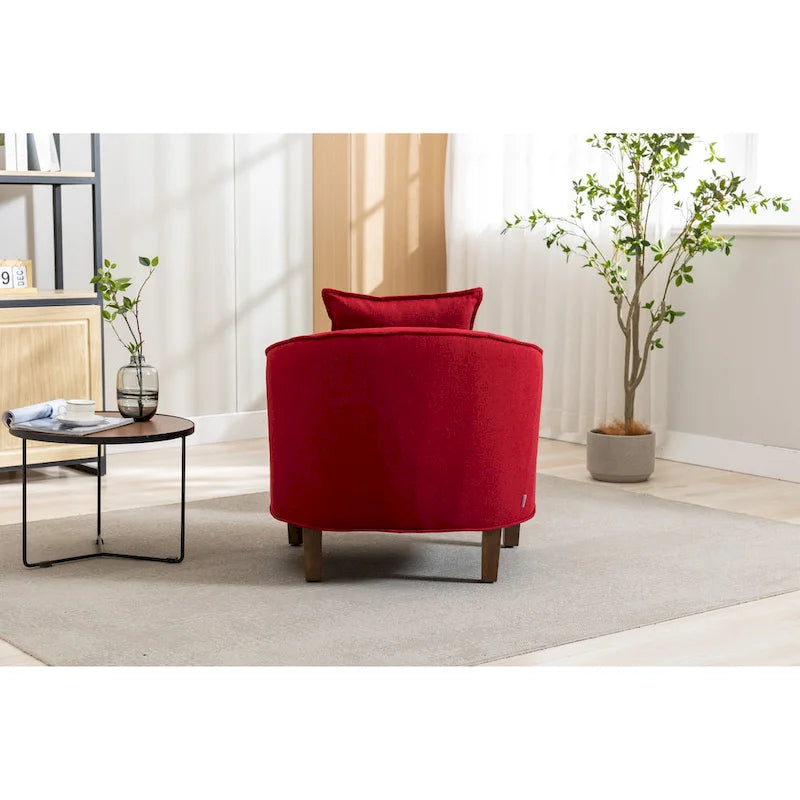 Fauteuil tonneau rembourré avec pouf