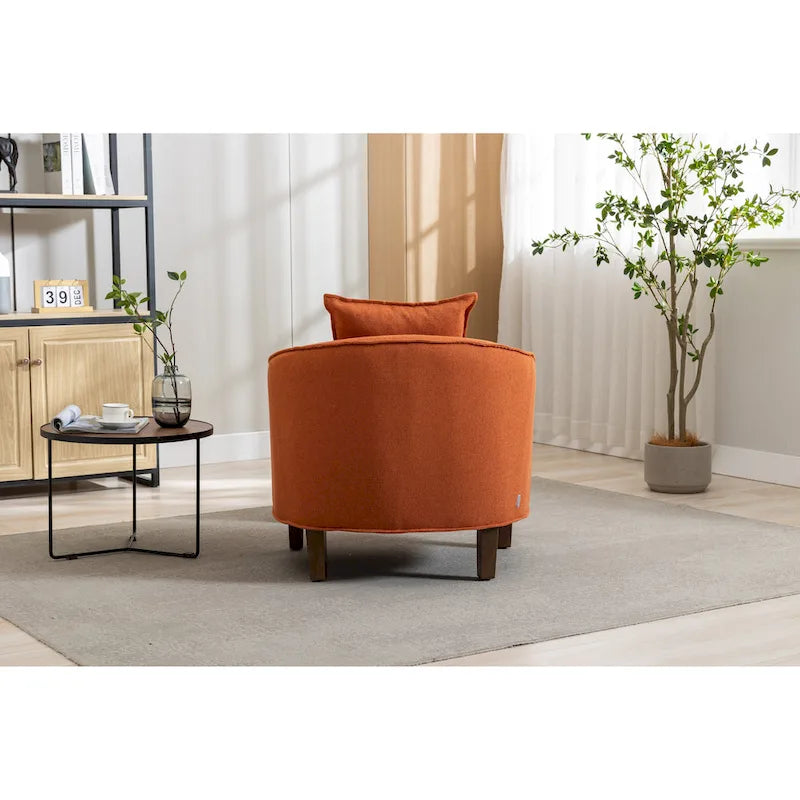 Fauteuil tonneau rembourré avec pouf